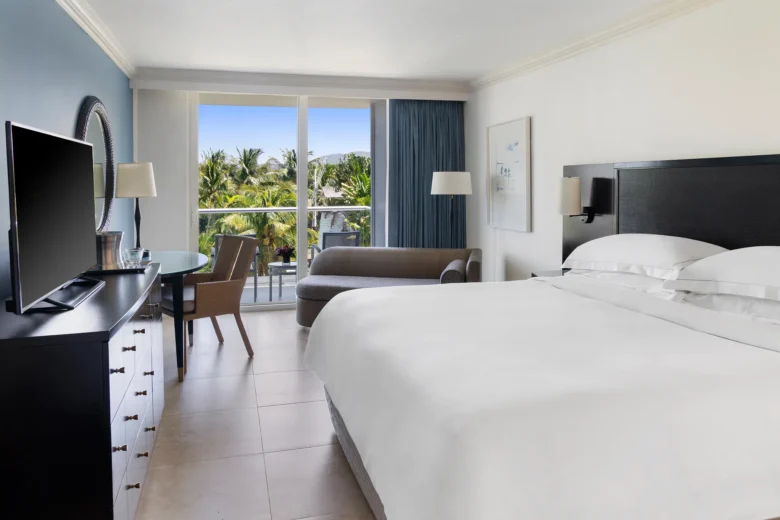 Mountain View king room with private balcony at Dreams Rose Hall Resort & Spa in Jamaica.