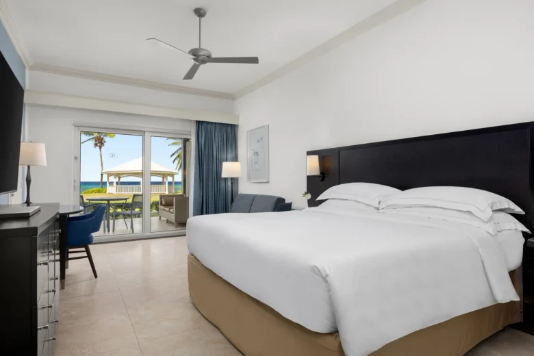 Oceanfront Walkout king room with private terrace at Dreams Rose Hall Resort & Spa in Jamaica.