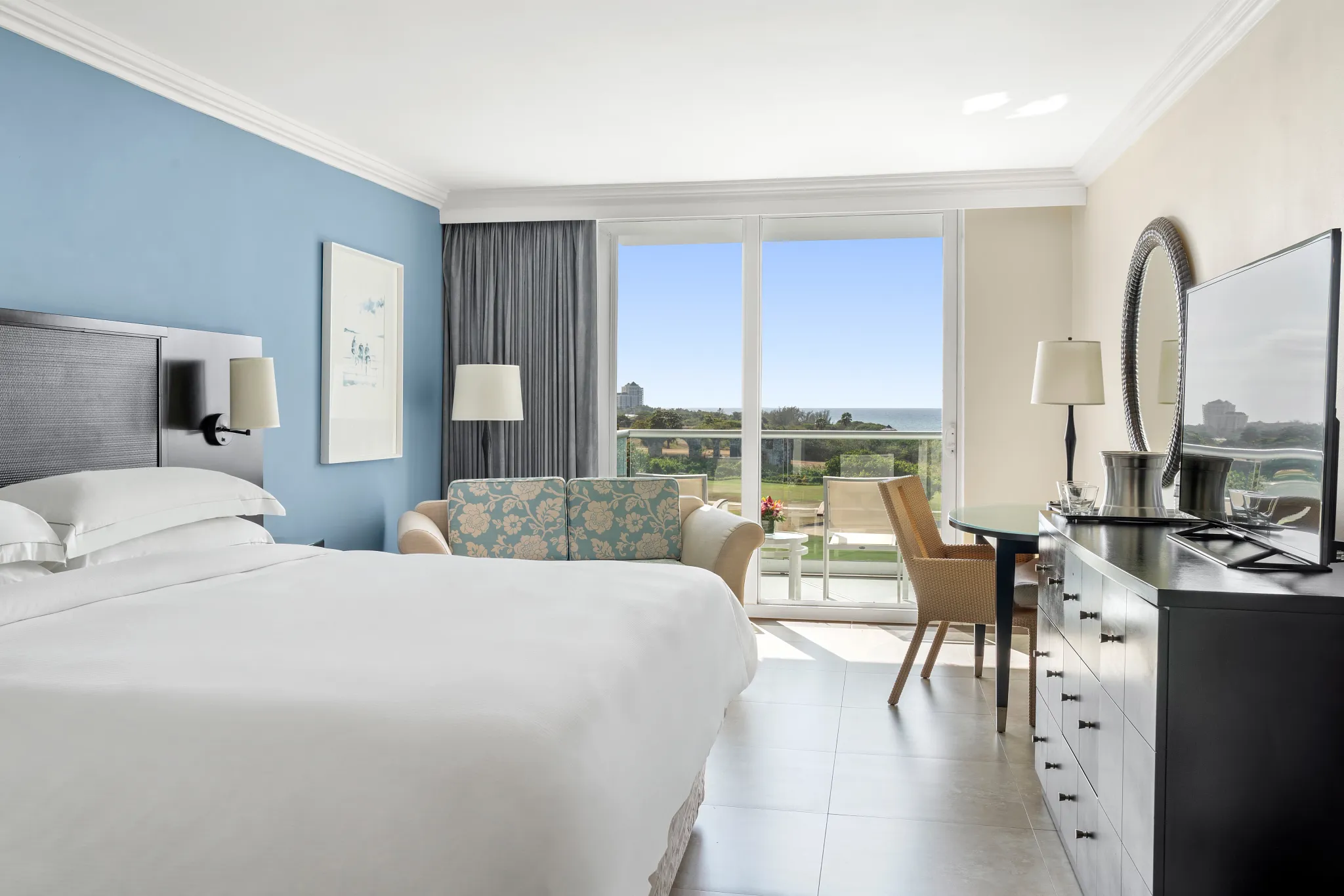 Partial Ocean View king room with private balcony at Dreams Rose Hall Resort & Spa in Jamaica.