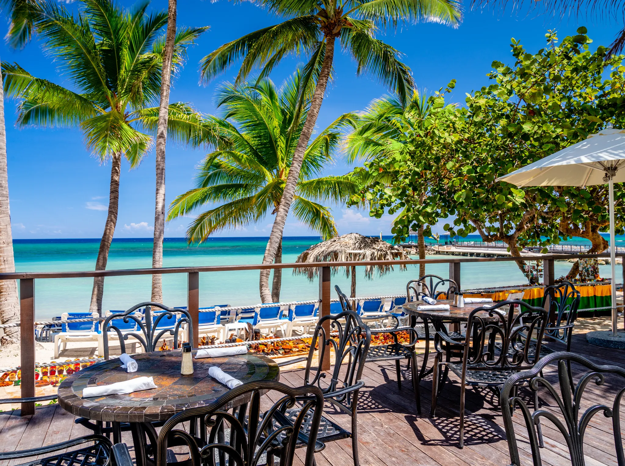 King Frog Bar at Dreams Rose Hall Resort & Spa is a vibrant resort bar offering tropical cocktails, ice-cold beverages, and casual poolside relaxation in a lively Caribbean-inspired atmosphere.